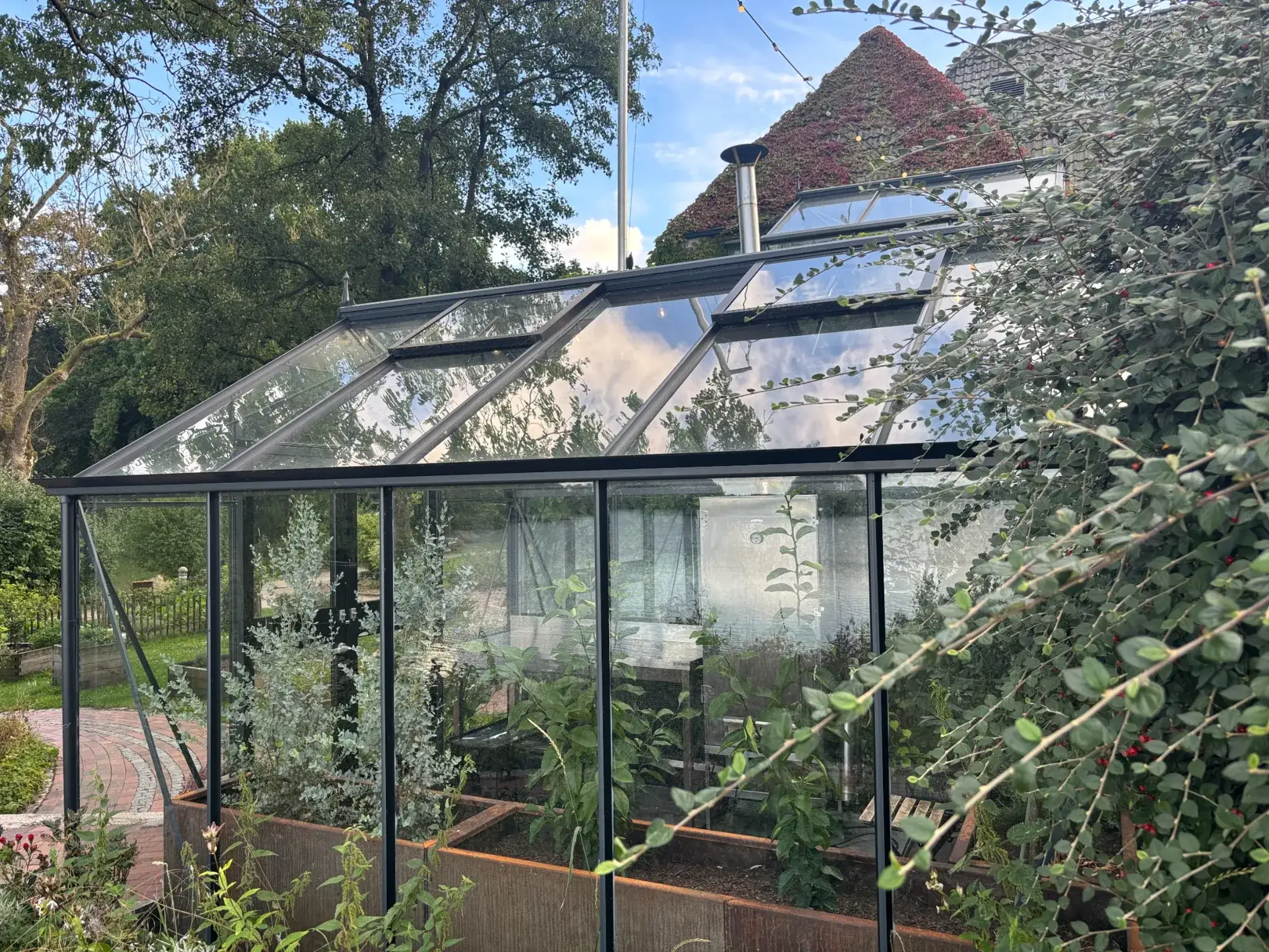 Gewächshaus des Seehotel Töpferhaus, beheizt mit der Abwärme des Blockheizkraftwerks