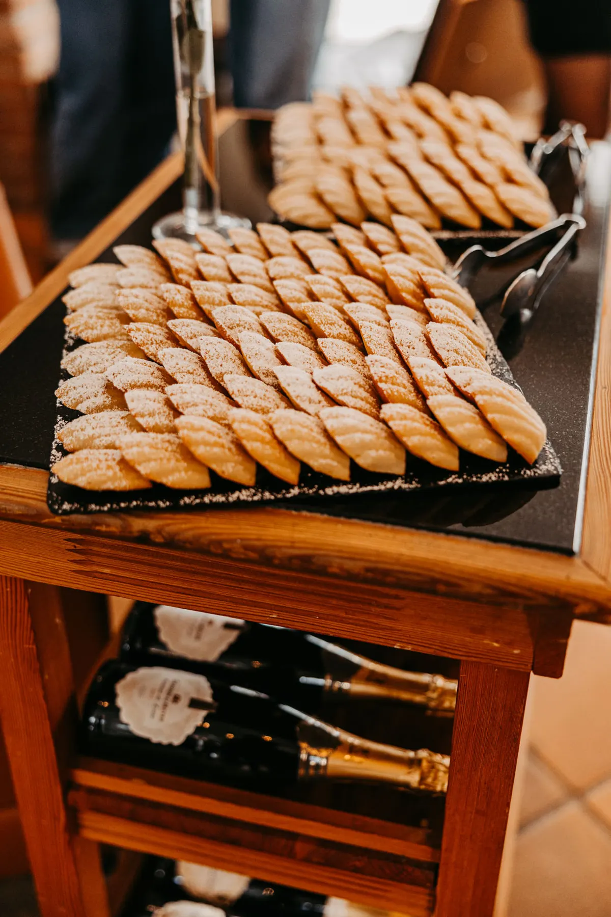 Madeleines und Champagne beim Empfang